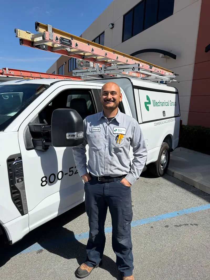 Orlando Volanti, Mechanical Group technician in NorCal, standing in front of the new Ford F-250 service truck.
